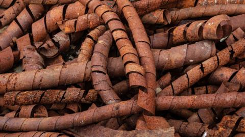 File image of rusty copper coils from a mine

