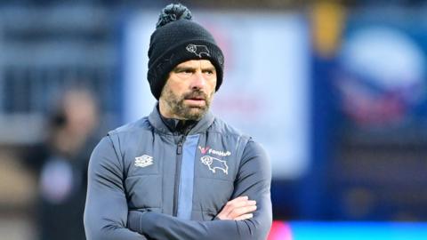 Derby County boss Paul Warne looks on during a game