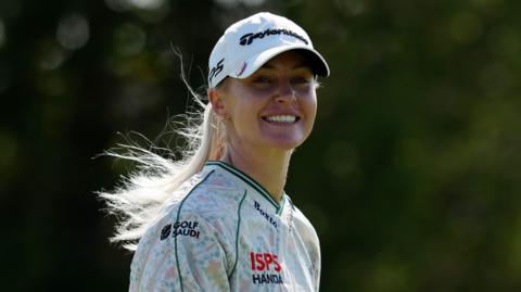 England's Charley Hull smiles during the third round of the Queen City Championship in Ohio