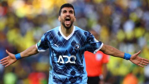 Walid El Karti celebrates scoring a late equaliser for Pyramids with team-mate Mohamed Chibi