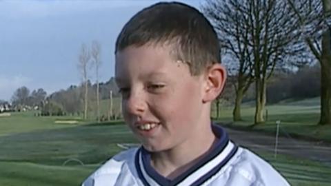 Rory McIlroy being interviewed in 1998.