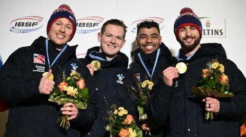 Brad Hall, Taylor Lawrence, Arran Gulliver and Greg Cackett celebrate with their gold medals