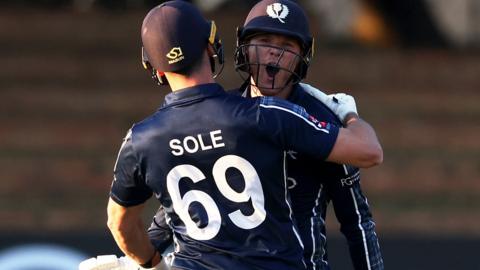 Scotland's Chris Sole and Michael Leask celebrate