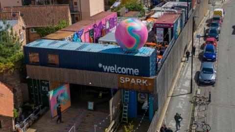 An aerial shot of SPARK in York, showing a number of shipping containers making up a venue.