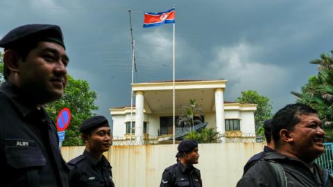 Malaysian police officers gather before a protest organised by members of the youth wing of the National Front, Malaysia's ruling coalition, in front of the North Korea embassy, following the murder of Kim Jong-nam, in Kuala Lumpur, Malaysia, on 23 February 2017