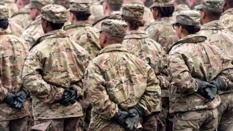 US soldiers stand in formation during the military picnic "Safe Poland" in the town of Boleslawiec on 5 February, 2017.