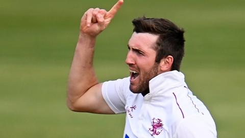 Craig Overton celebrates