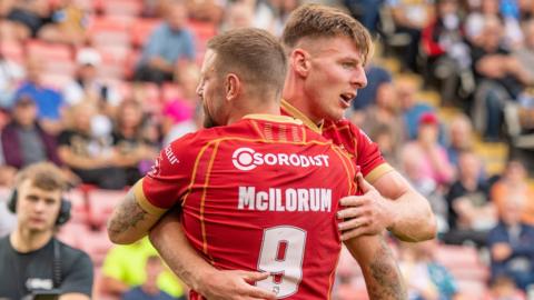 Catalans Dragons celebrate a try