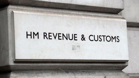 HM Revenue and Customs (HMRC) sign on a white stone building