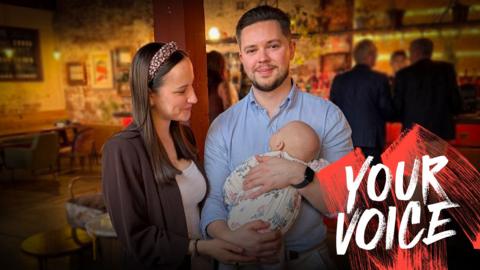 Ben Richmond and his wife and child