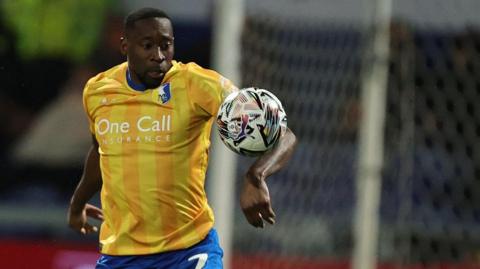 Lucas Akins in action for Mansfield Town