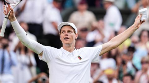 Jannik Sinner celebrates winning the Wimbledon title