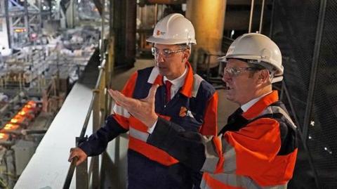 Ed Miliband and Sir Keir Starmer at the Scunthorpe steel plant in June 2023