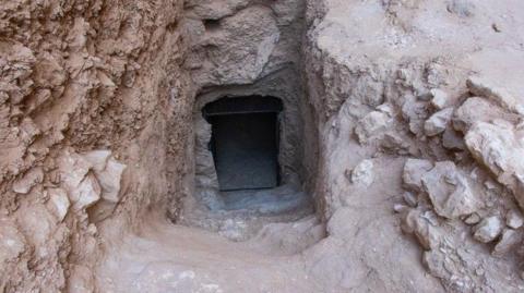 The rock-surrounded entrance to the tomb of King Thutmose II