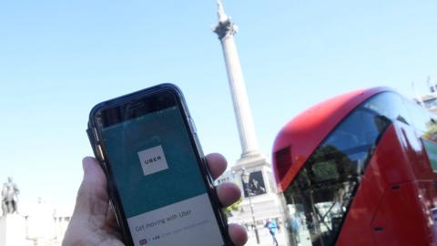 Uber app in Trafalgar Square
