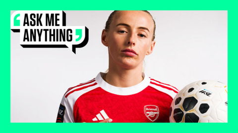Arsenal's Chloe Kelly holds up a football