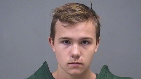 Justin Olsen, 18, is charged with threatening a federal law enforcement officer