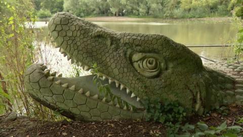 A dinosaur sculpture in Crystal Palace Park