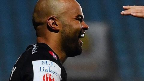 Tom O'Flaherty celebrates scoring for Exeter