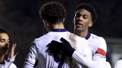 Ethan Wheatley celebrates with Josh Acheampong 