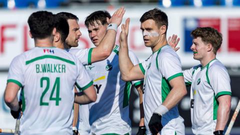 Ireland's hockey team celebrate a goal against Poland