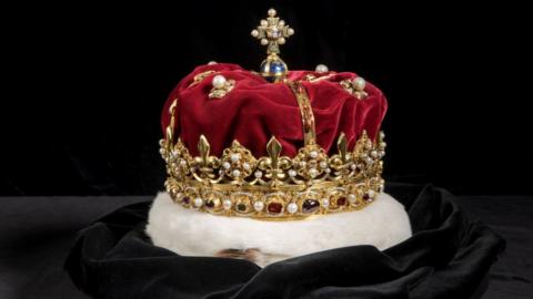 The Crown of Scotland sits on a black velvet cloth