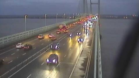 Image of the Prince of Wales Bridge. Traffic can be seen travelling in all lanes across both directions.