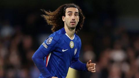 Marc Cucurella looking across the pitch while playing for Chelsea against Everton at Stamford Bridge