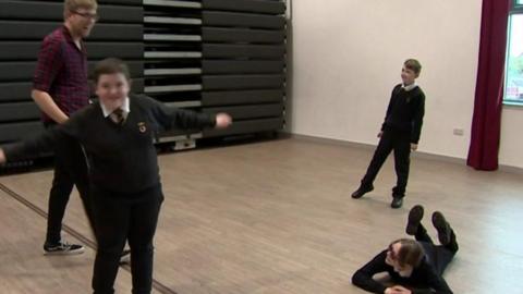 Young people taking part in theatre project