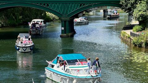 A flotilla of boats on the Rive Nene in Peterborough to mark D-Day