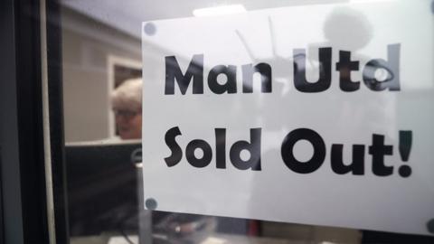 Sign saying Man Utd Sold Out!