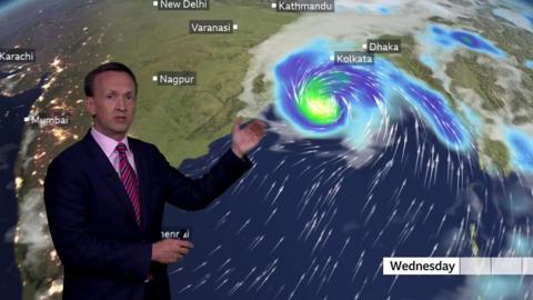 Nick Miller indicates the location of Cyclone Amphan