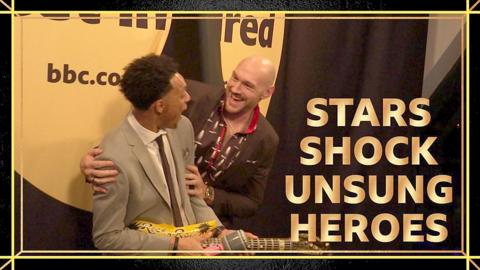 Tyson Fury (r) surprises Wales' Unsung Hero Asa Waite (l)
