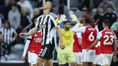 Dan Burn reacts after Arsenal's 2-1 win against Newcastle United at St James' Park on 28 September, 2025