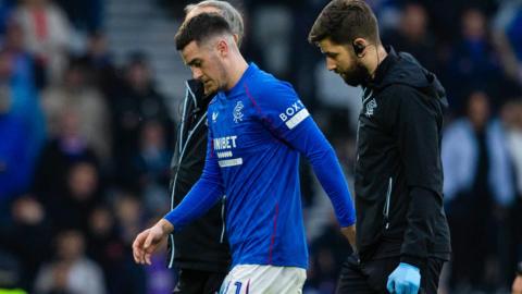 Rangers' Tom Lawrence looks dejected as he goes off injured during a Premier Sports Cup semi-final match between Motherwell and Rangers at Hampden Park