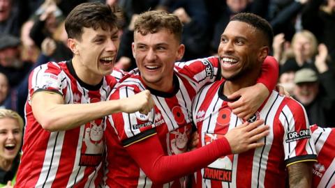 Sheffield United players celebrate a goal