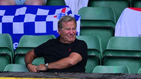 Presenter Jeff Stelling watching Hartlepool United v Yeovil