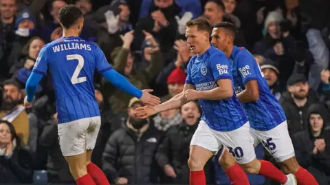 Matt Ritchie is congratulated by team-mates after scoring one of his goals