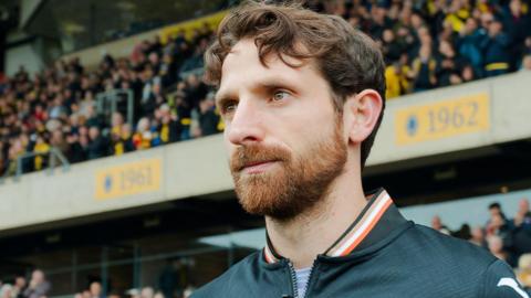 Joe Allen prepares to play for Swansea