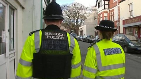 Police officers on a street in Wales
