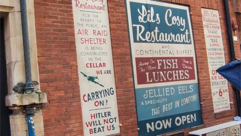 1940s signs on wall
