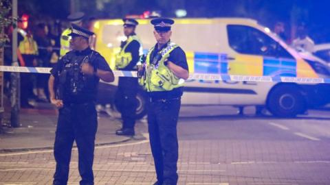 Police officers at crime scene