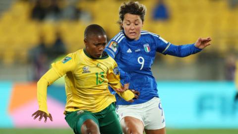 Bambanani Mbane of South Africa battles for possession with Valentina Giacinti of Italy