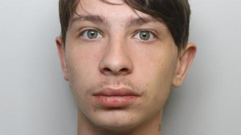 Custody image of Alfie Clark