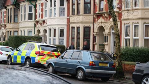 Armed police outside a house in Kimberley Road, Cardiff