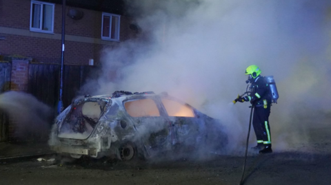 Firefighters tend to a burning police in Hartlepool