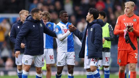 Augustus Kargbo of Blackburn Rovers is congratulated by teammates Yuri Ribeiro and Yuki Ohashi following the Championship match between Blackburn Rovers and Stoke City at Ewood Park on October 04, 2025