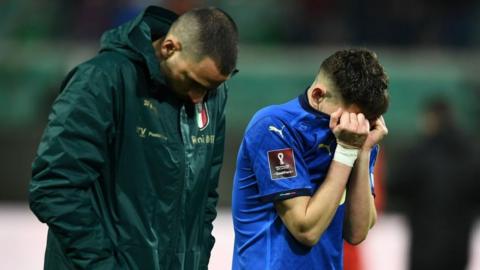 Italy players after defeat by North Macedonia