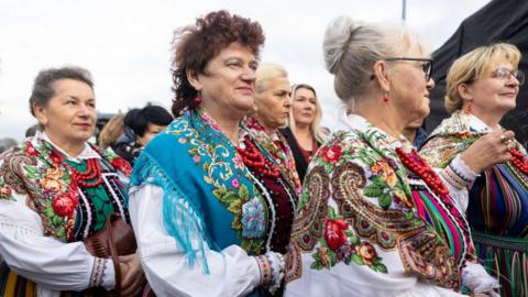 Women in folk costumes during Law and Justice party convention before the Poland election, Przysucha