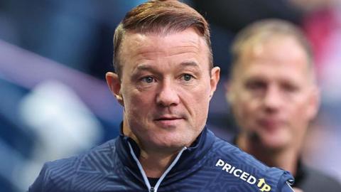 Reading boss Noel Hunt looks on 